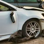A close up of 2 damaged cars, showing the importance of understanding Maryland car accident statistics,