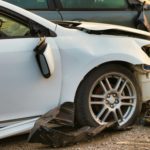 A close up of 2 damaged cars, showing the importance of understanding Maryland car accident statistics,